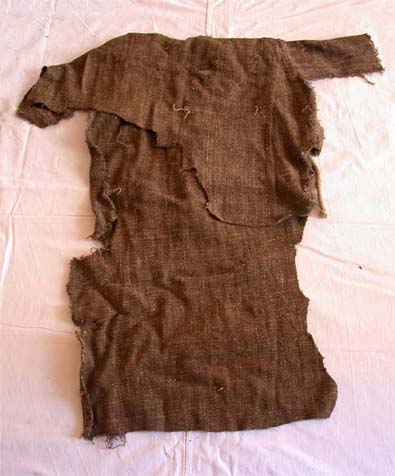 Tunic preserved in basilica of Santa Croce in Florence, made 80 years after St. Francis of Assisi death, late 13th century